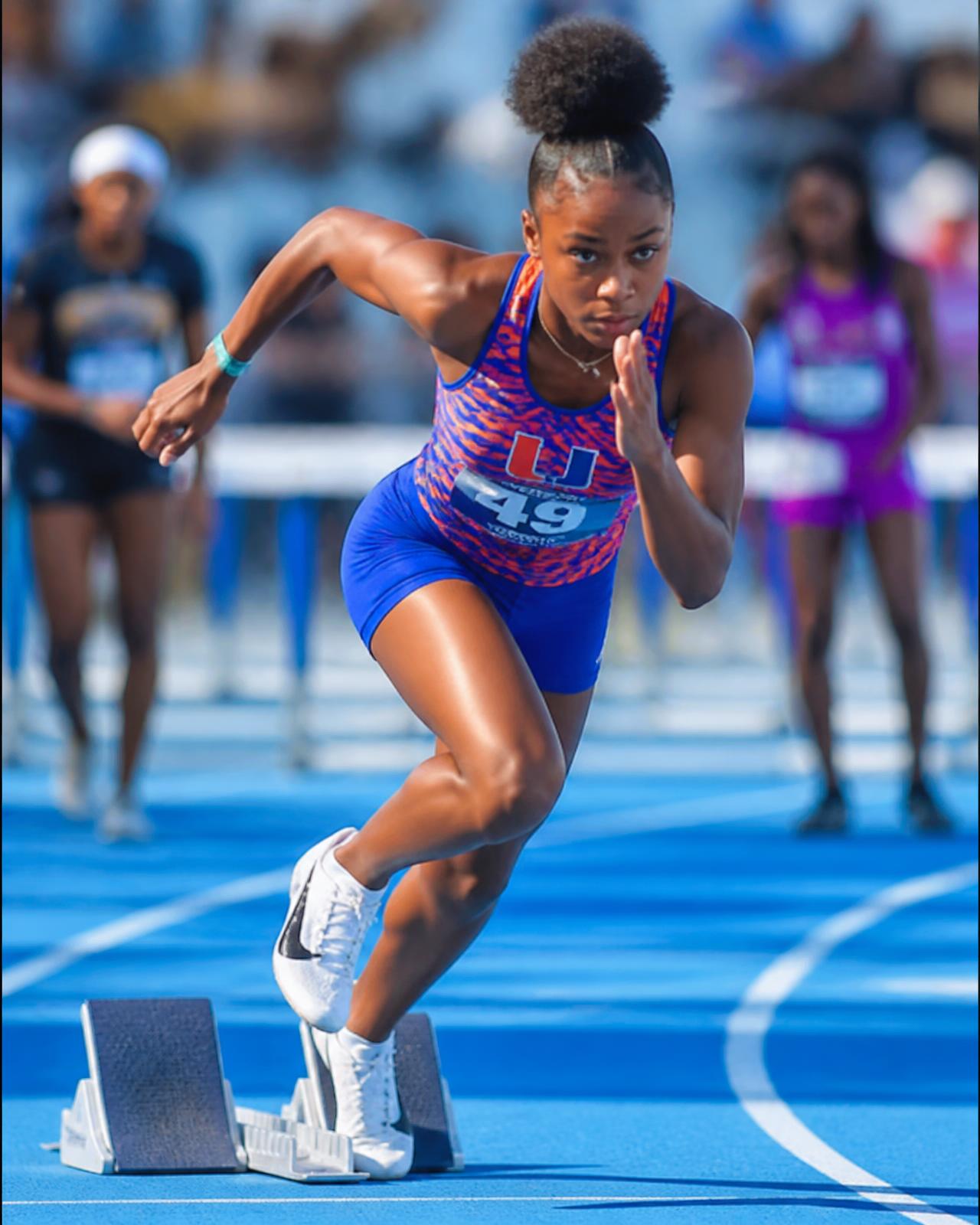 Sprinter exploding out of the blocks